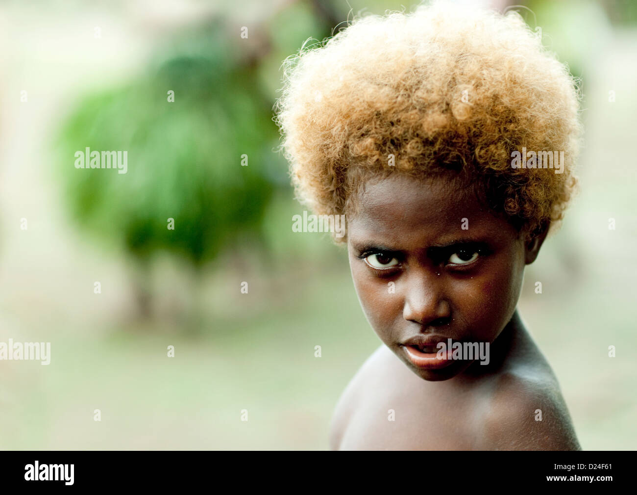 Blonde Hair Kid, New Ireland Island, Papua New Guinea Stock Photo