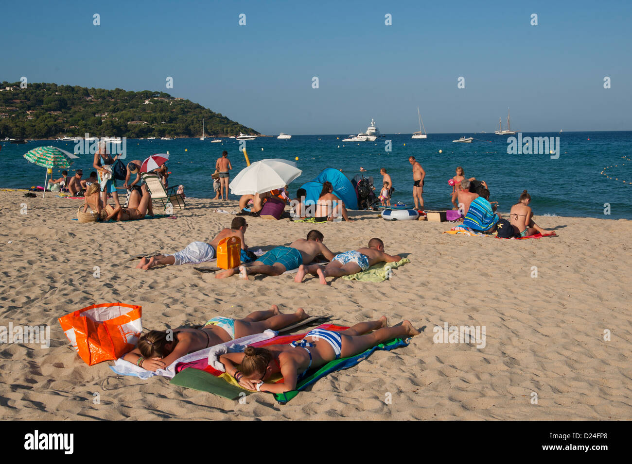 Sunbath, Sun, People, Beach, Tahiti, Plage Tahiti, Sea, Sant Tropez, St. Tropez, France, Europe Stock Photo