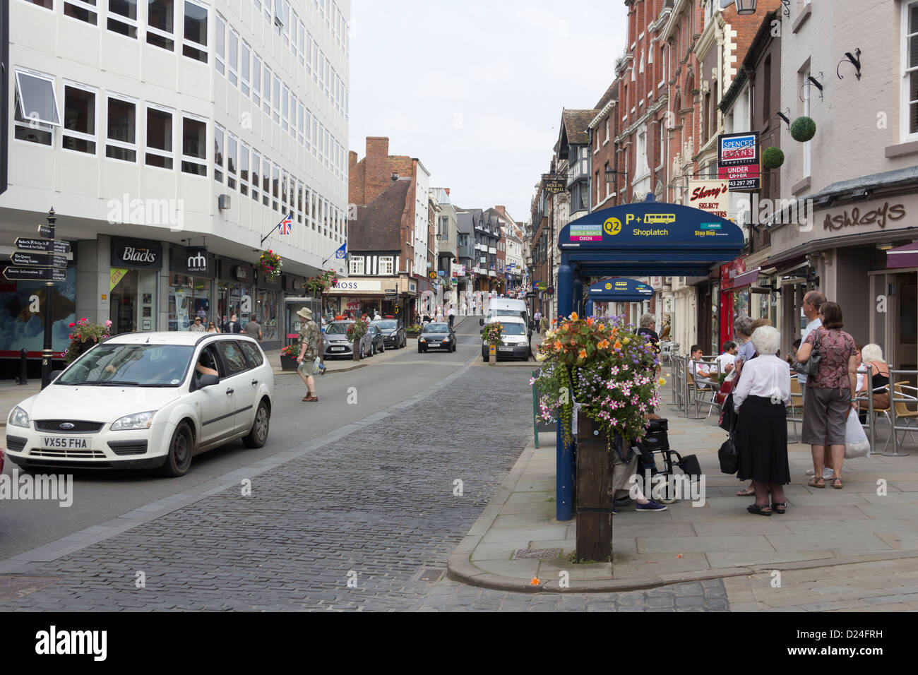 Shoplatch, Shrewsbury at its junction with Market Street with people