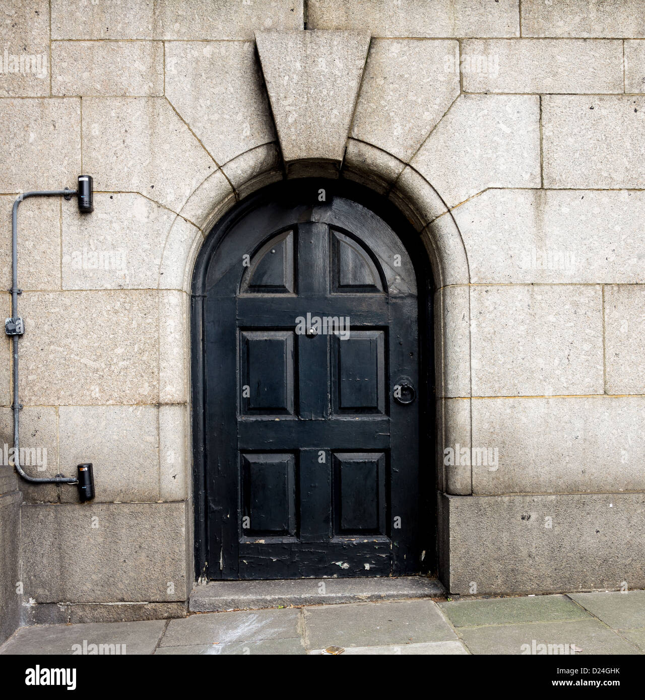 Black arched door Stock Photo
