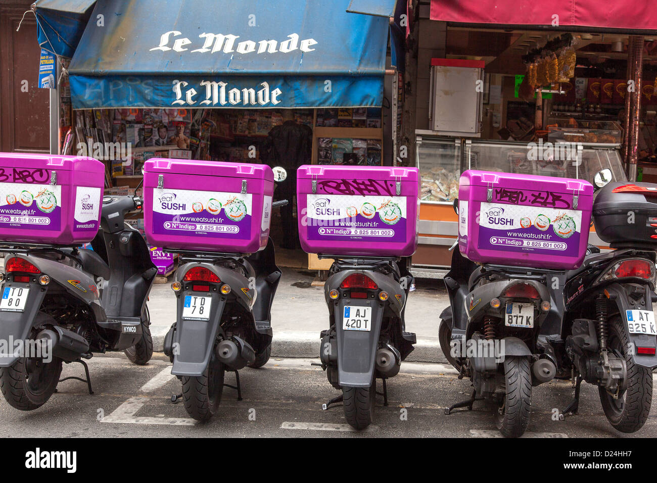 Sushi delivery scooters. Paris, France. Stock Photo