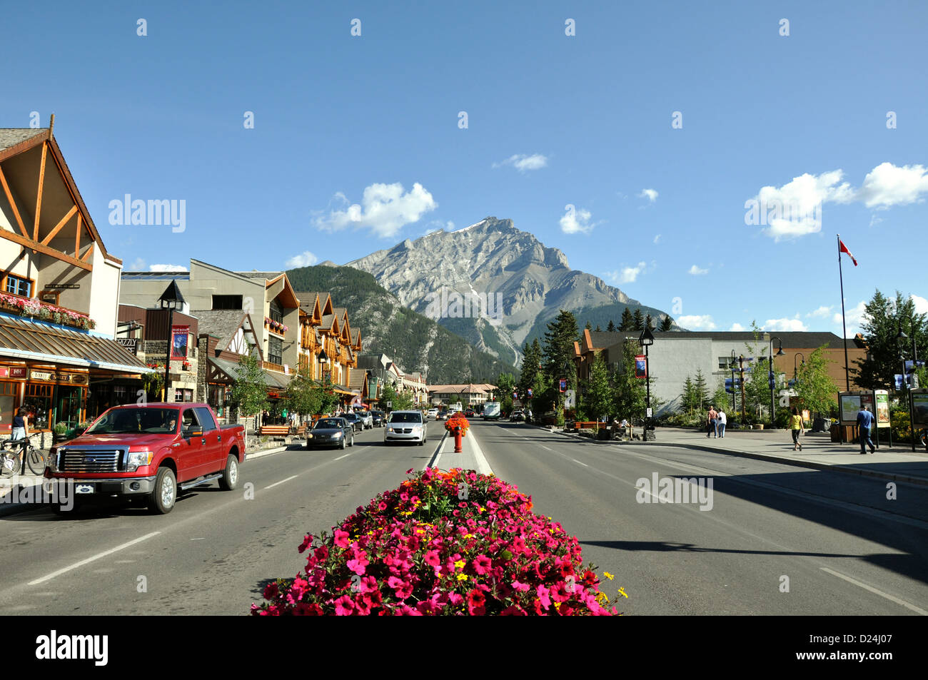 BANFF, CANADA - AUGUST 04: street view of famous Banff Avenue in a sunny summer day on Augist 04, 2011 in Banff, Alberta Stock Photo