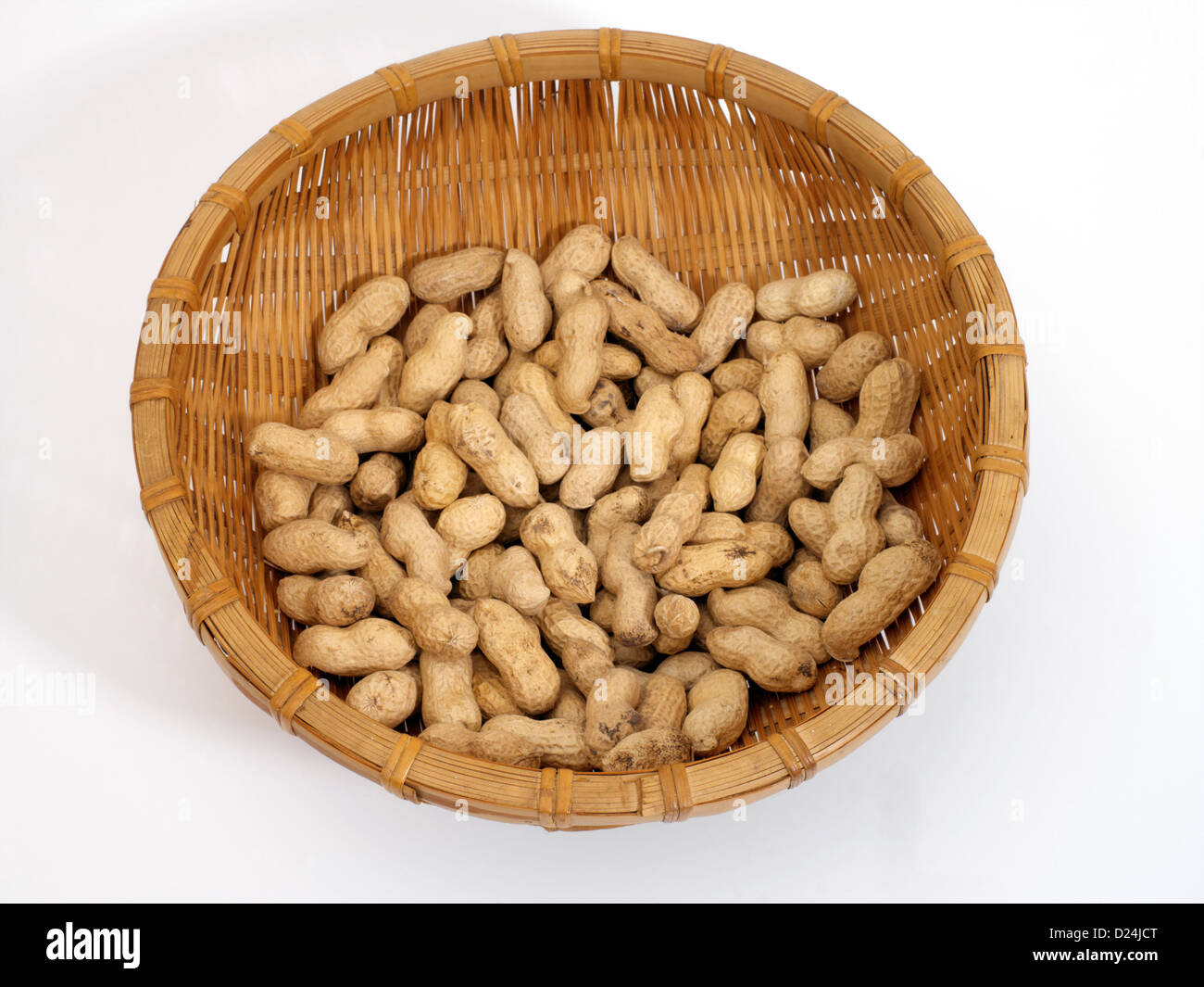 Peanuts in their Shells in a Basket Stock Photo