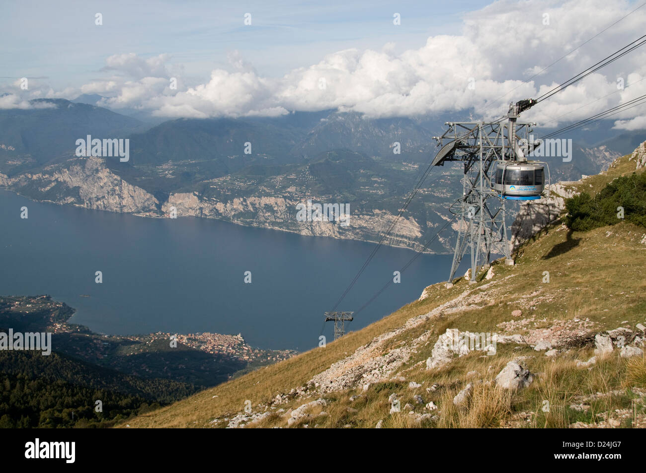A cable car on the 2,218m summit of Mount Baldo above the medieval town of Malcesine on the eastern shore of Lake Garda from Monte Baldo, (Baldo mount Stock Photo