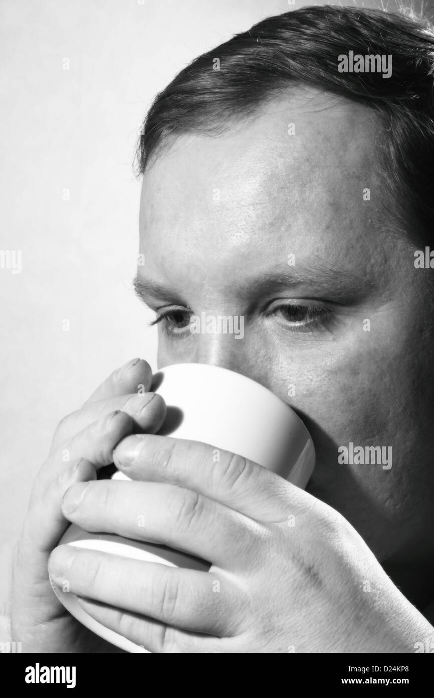 Man holding teacup hires stock photography and images Alamy