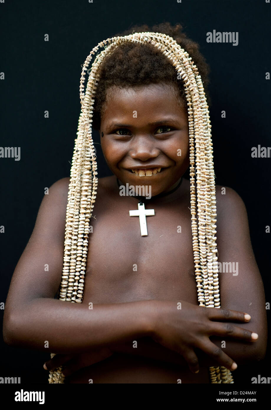 Girl Holding A Giant Shell Money, East New Britain, Papua New Guinea Stock Photo
