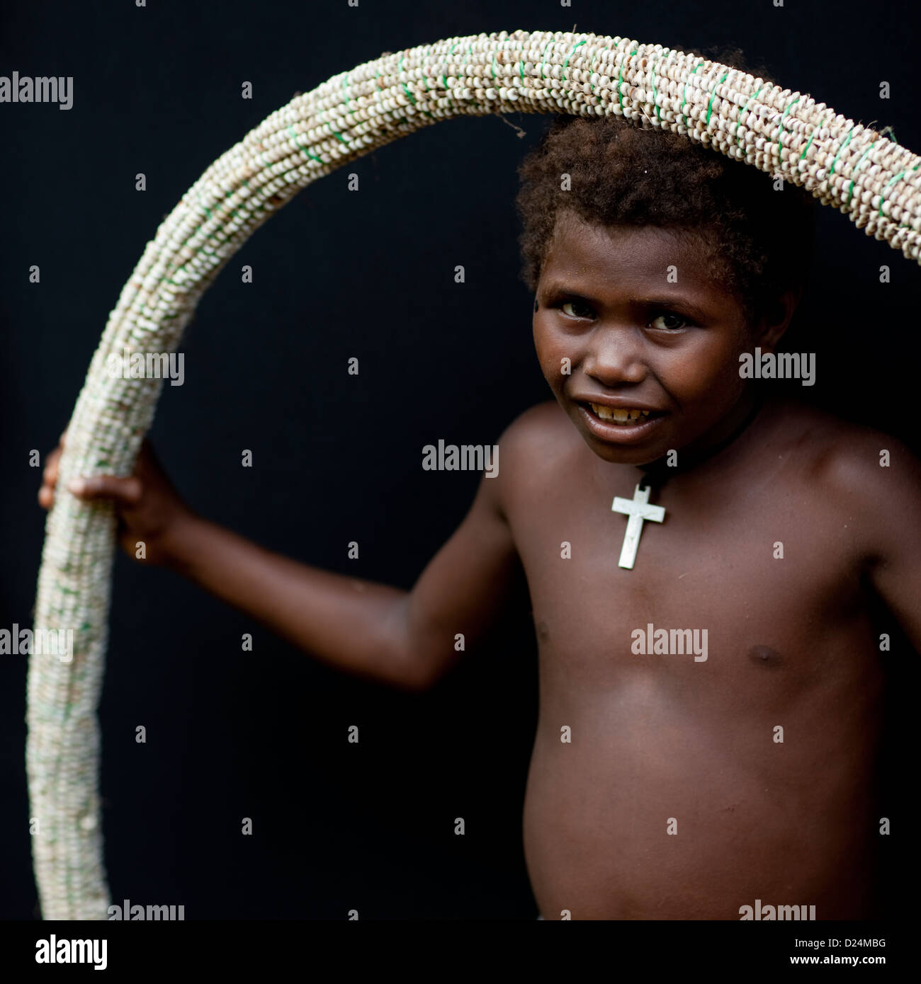 Girl Holding A Giant Shell Money, East New Britain, Papua New Guinea Stock Photo
