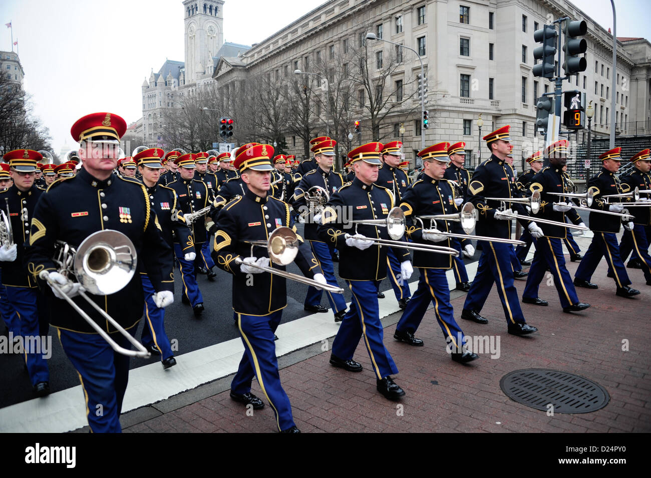 Master Sgt. William White, the U.S. Army Fife and Drum Corps' Senior Drum Major, gives movement commands to the unit during the presidential inaugural parade dress rehearsal on Pennsylvania Avenue, Jan. 13, 2013 . The soldier-musicians have been practicing for the parade, scheduled for Jan. 21, since October. Military involvement in the presidential inauguration dates back to April 30, 1789, when members of the U.S. Army, local militia units and revolutionary war veterans escorted George Washington to his first inauguration ceremony. (DoD Photo by Sgt. Katryn Tuton) (Released) Stock Photo