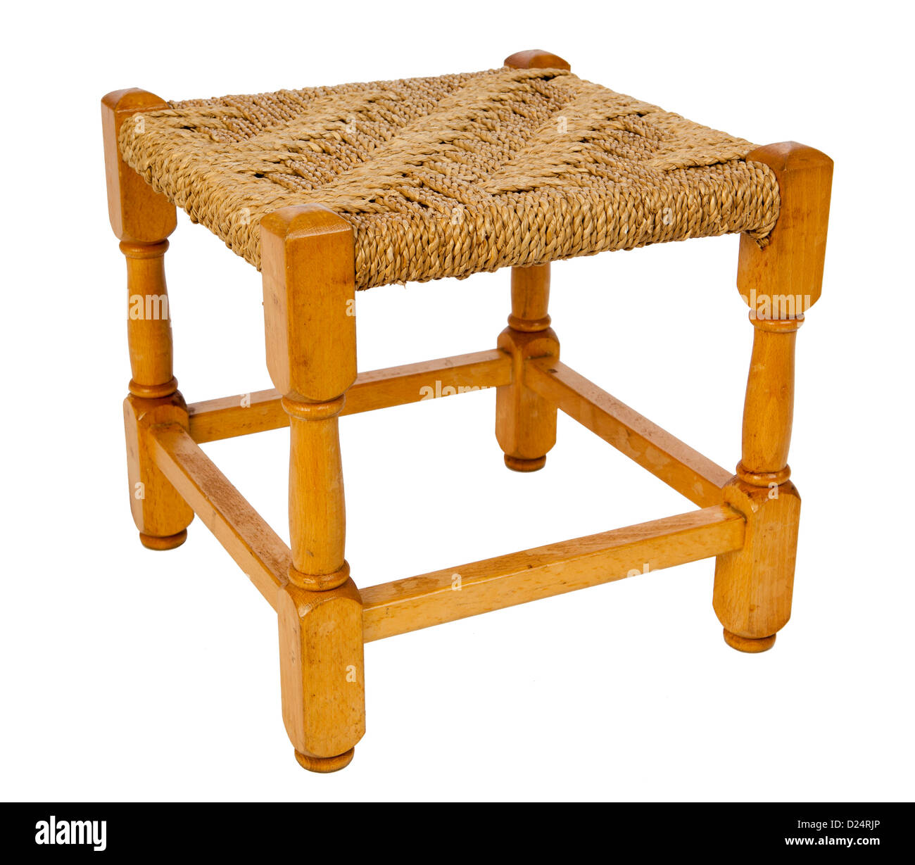 Furniture, small beech foot stool with woven rush seat Stock Photo