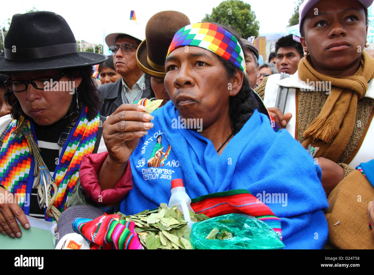 LA PAZ, BOLIVIA, 14th January. An Afro-Bolivian lady from the Yungas region chews coca leaves to celebrate Bolivia rejoining the 1961 UN Single Convention on Narcotic Drugs. Bolivia formally withdrew from the Convention in 2011 and had been campaigning for clauses banning traditional uses of the coca leaf to be removed. By the 11th January 2013 deadline only 15 countries (less than the 62 required to block the proposal) had registered an objection to Bolivia rejoining the Convention with special dispensations. Rejoining will come into effect from 10th February 2013. Stock Photo