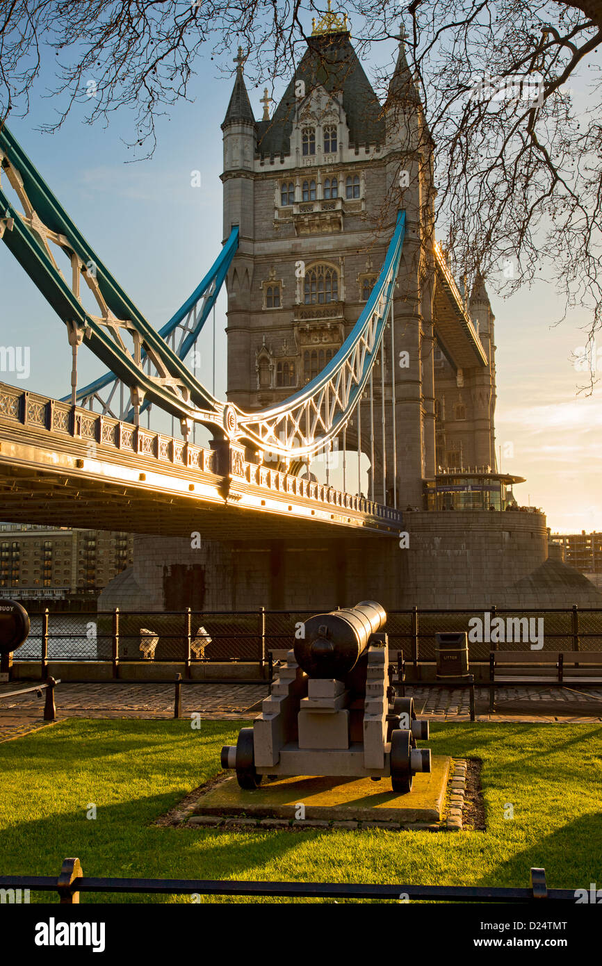 Tower Bridge in late afternoon light viewed from North side of river Thames and tower of London. Stock Photo