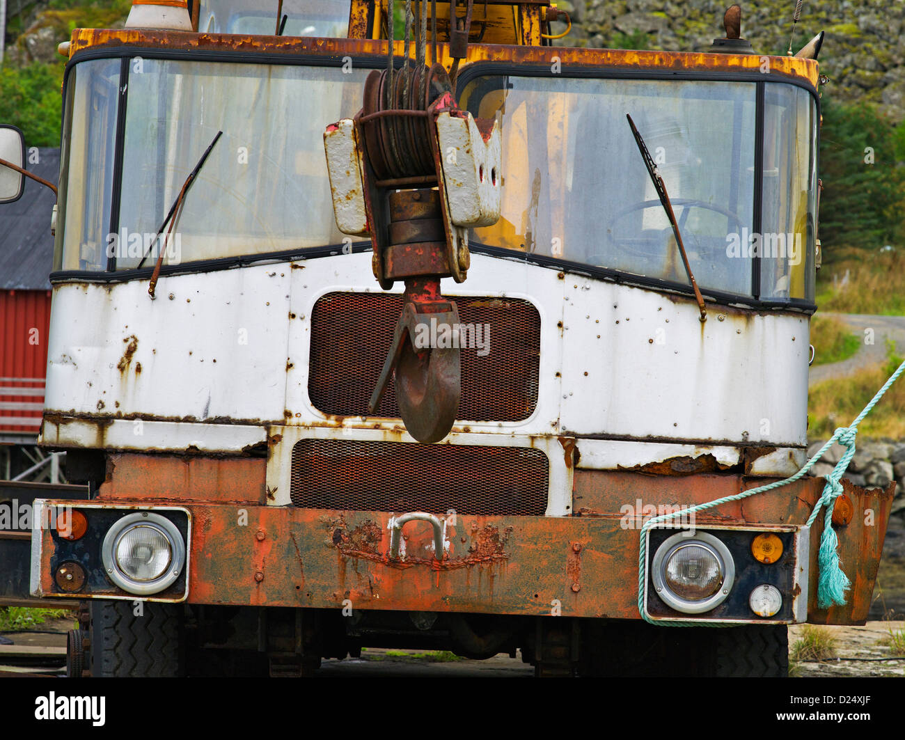 Abandoned crane-truck in the boatyard at Ballstad in the Lofoten Islands, arctic Norway Stock Photo