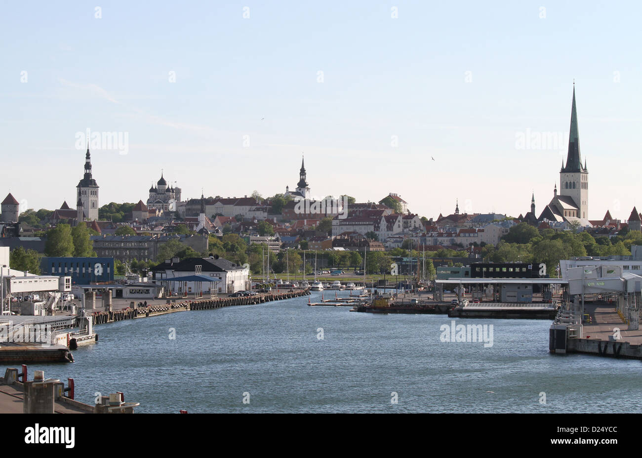 Empty ferry berths in the port of Tallinn Estonia with the buildings and spires of the city of Tallinn in the background on a spring May evening. Stock Photo