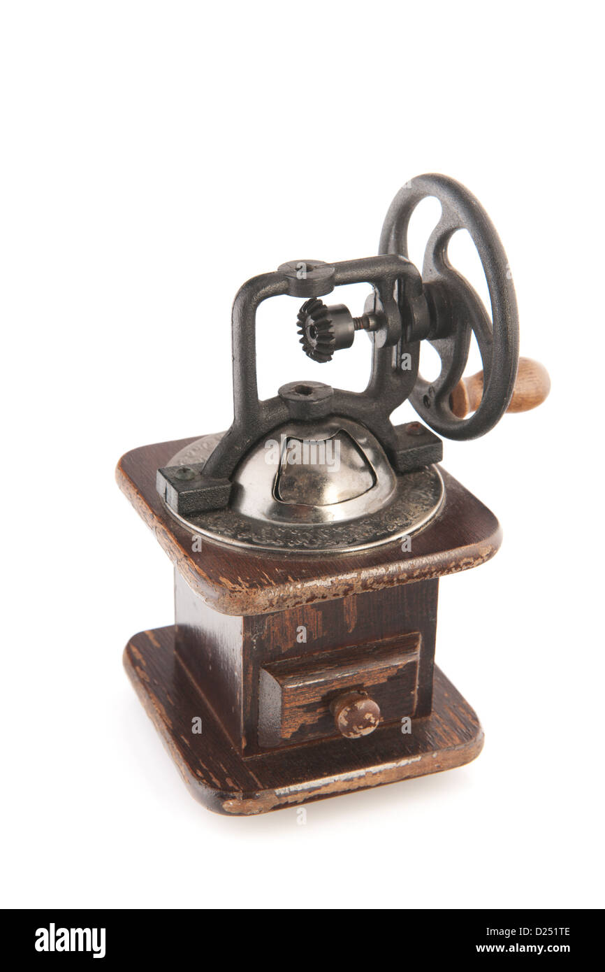 Old-fashioned coffee grinder with wheel Stock Photo