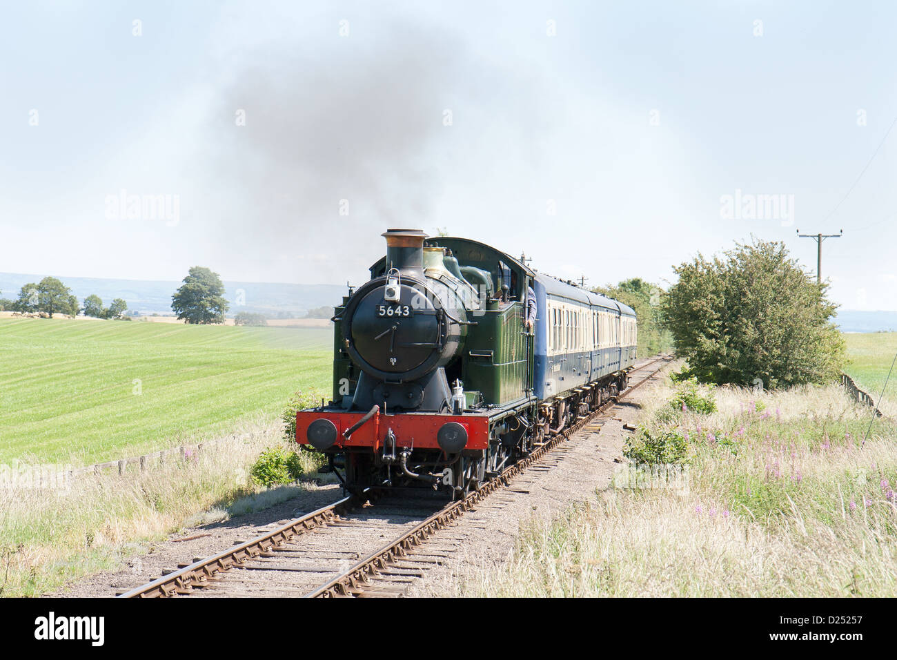 Steam locomotive pulling a passenger train on the Wensleydale Railway Stock Photo