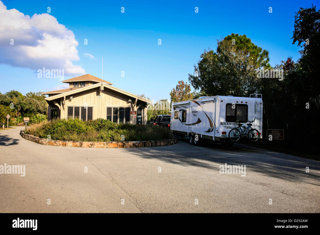 A fifth wheel enters the Myakka State Park campground during high season Stock Photo