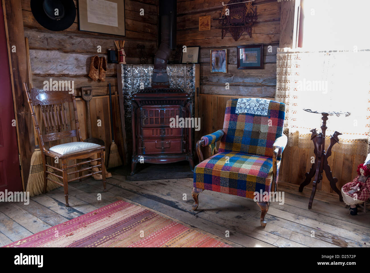 Fireplace Adds Warmth To This Rustic Old Log Cabin Stock Photo