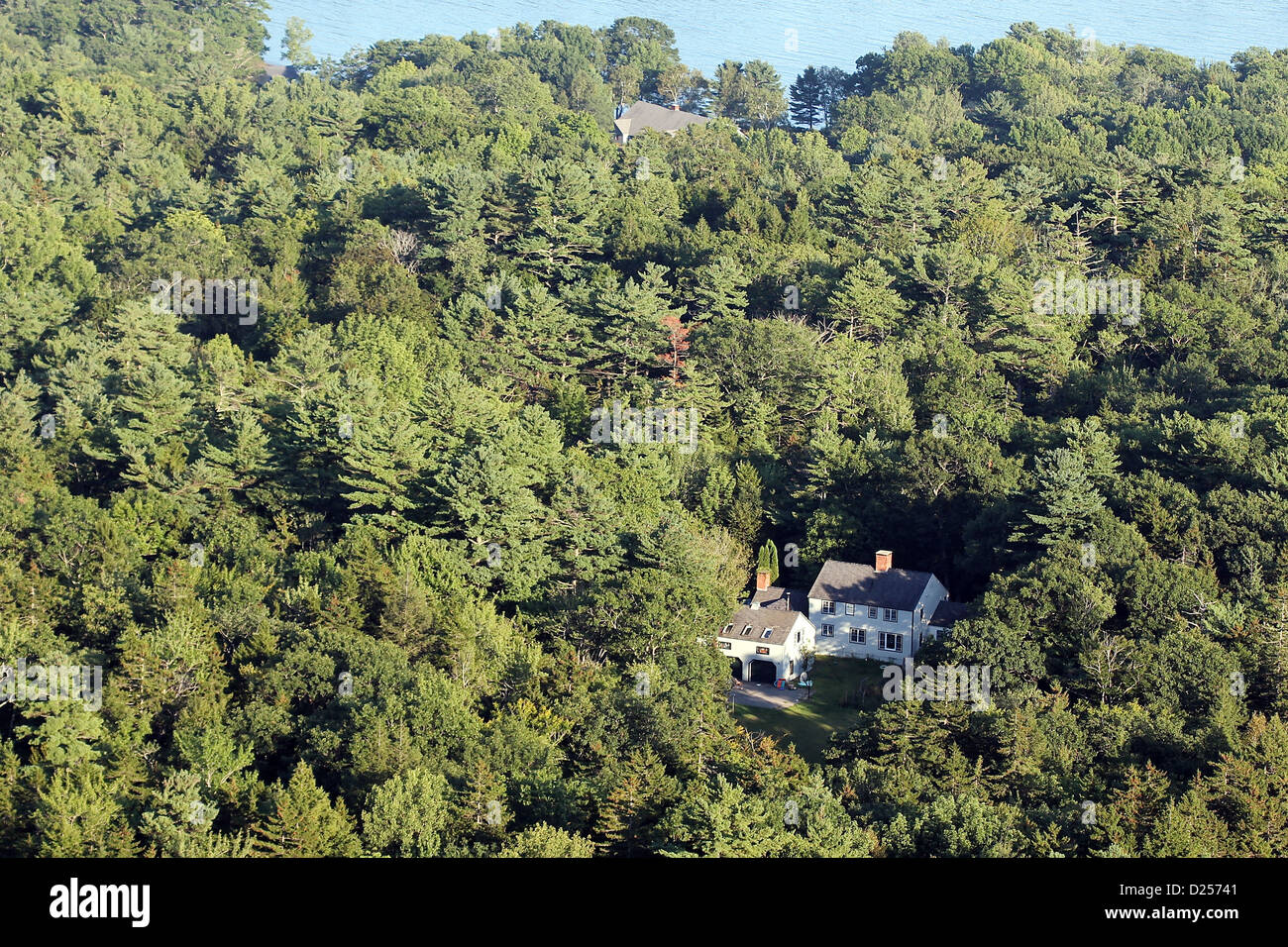A home surrounded by trees, seen from above, Camden, Maine Stock Photo