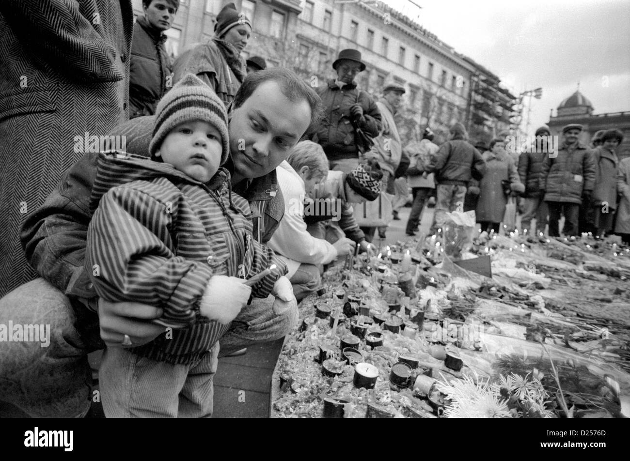 November 1989 Father and child lighting a candle in Wenceslas Square, Prague, Czech Republic to mark the fall of communism. Stock Photo
