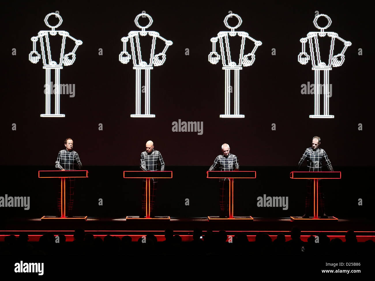 The members of the German electronic band Kraftwerk perform on stage at the arts exhibition venue 'Kunstsammlung Nordrhein-Westfalen' in Duesseldorf, Germany, 11 November 2013. Photo: Oliver Berg Stock Photo