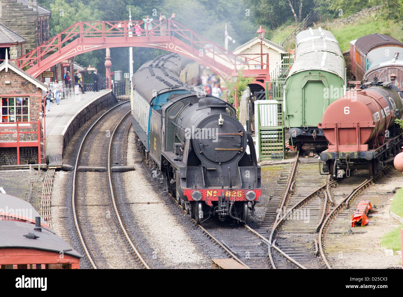 Steam locomotive pulling a passenger train on the North Yorkshire Moors Railway  at Goathland Stock Photo