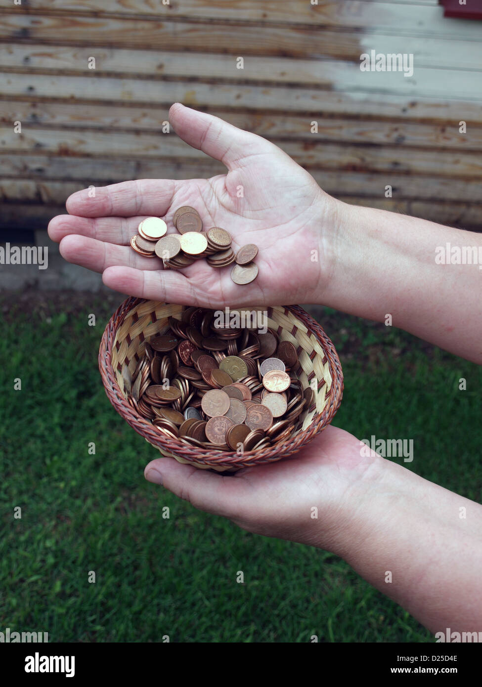 Coins basket money hi-res stock photography and images - Alamy