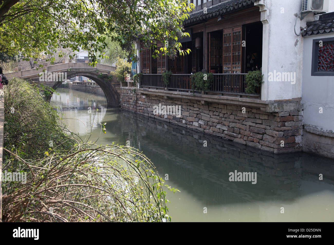 It's a photo of few old houses along a river in a Chinese city in China ...