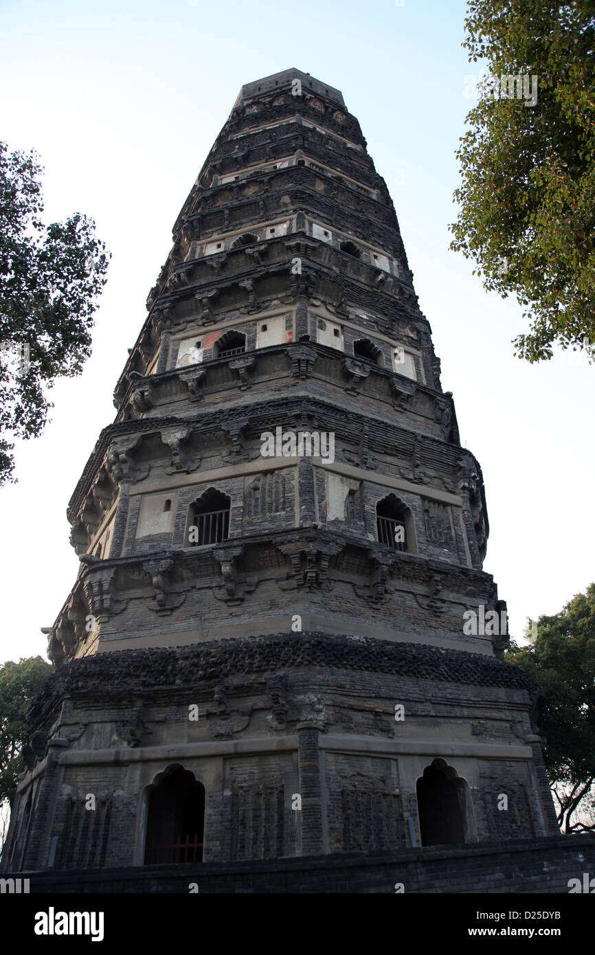 It's a photo of the tower of a Chinese temple in china. It's not straight like Pisa Tower in Italia. It is Leaning Stock Photo