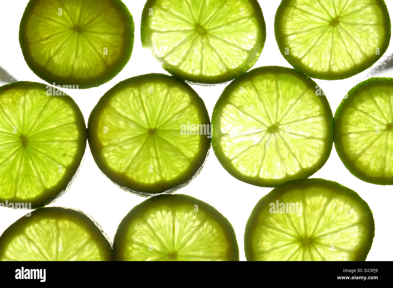 Freshly sliced limes Stock Photo