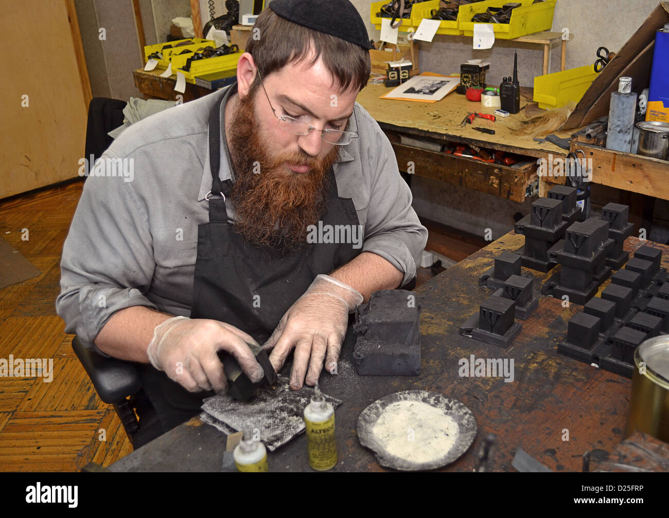 Portrait of an orthodox Jewish rabbi preparing new phylacteries ...
