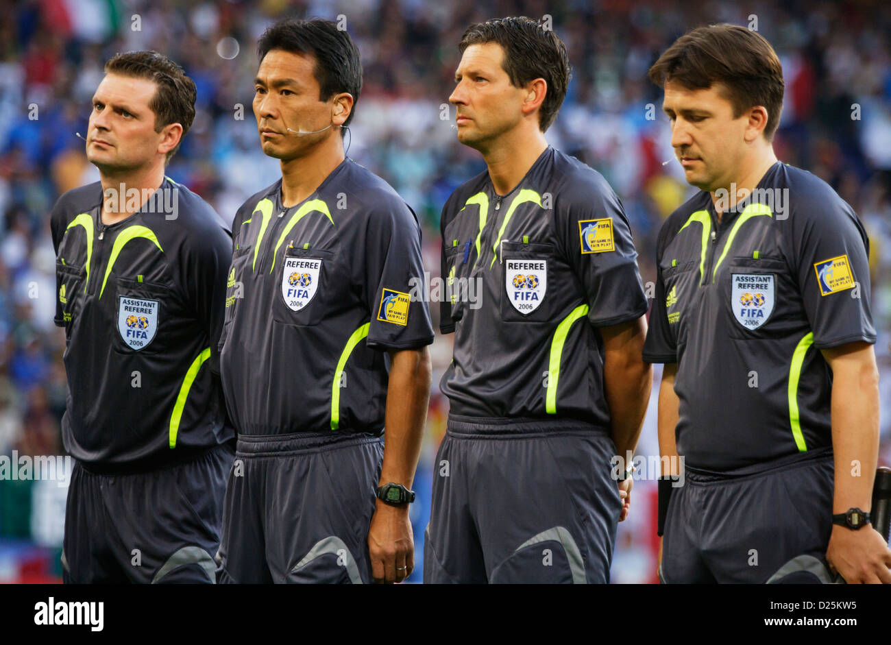 The officiating team lines up before the FIFA World Cup quarterfinal soccer match between Italy and Ukraine. Stock Photo