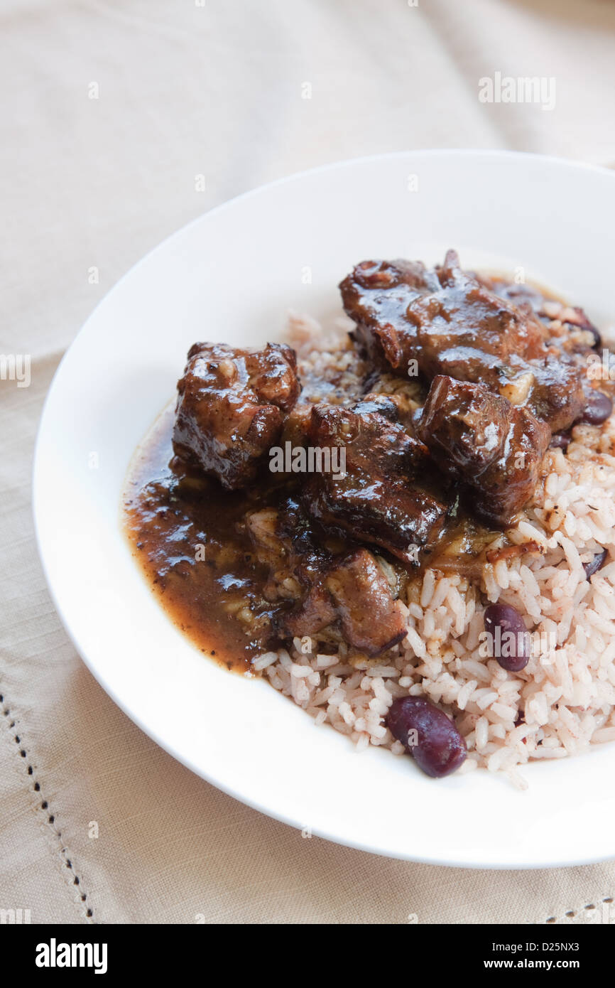 Caribbean style curried Oxtail served with rice mixed with red kidney