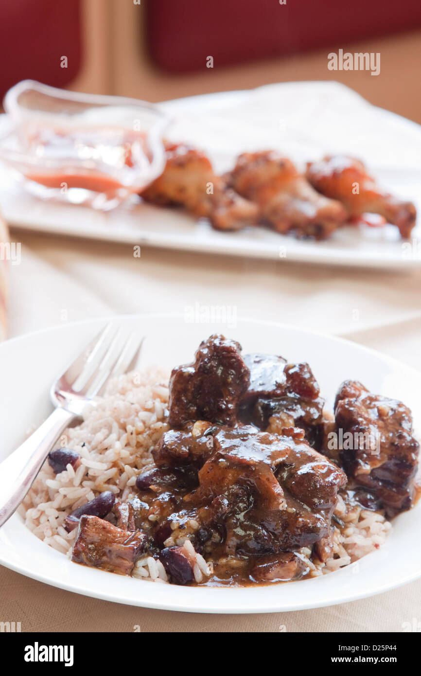 Caribbean style curried Oxtail served with rice mixed with red kidney