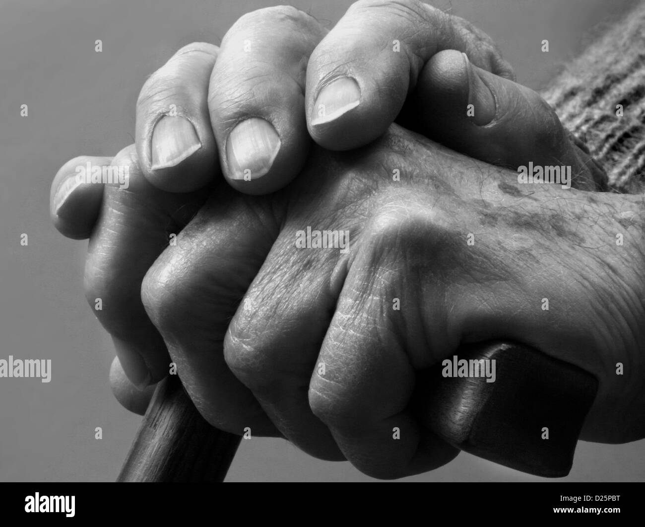 Hands on walking cane Stock Photo Alamy