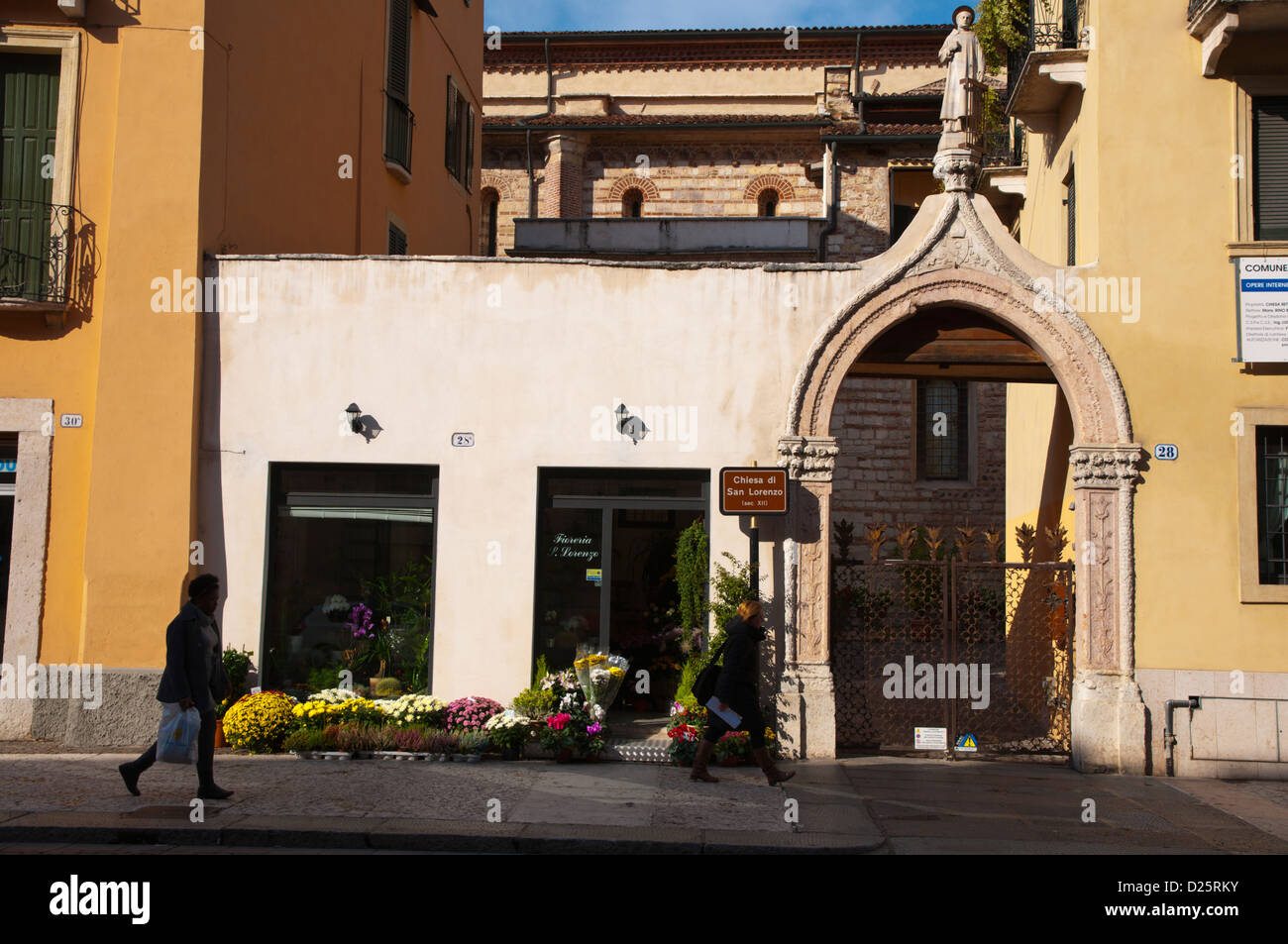 San Lorenzo church and flower shop exterior central Verona city the Veneto region northern Italy Europe Stock Photo