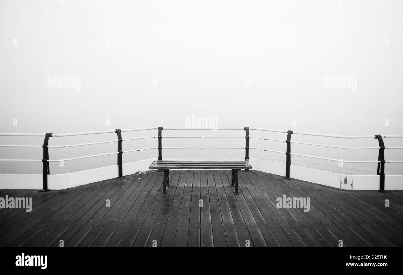 Heavy sea fret descends on the pier at Saltburn in Cleveland. Stock Photo