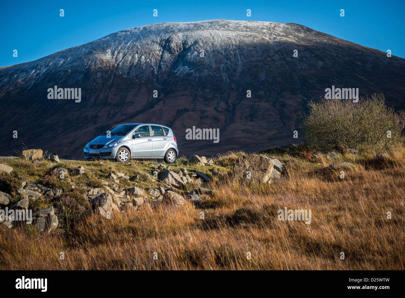 Mercedes Benz A-Class Car with mountain behind Stock Photo
