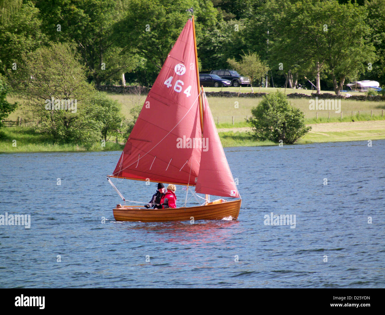 Ullswater Lake. Lake District Cumbria UK. Sailing dingy sails by on Ullswater Lake. Stock Photo