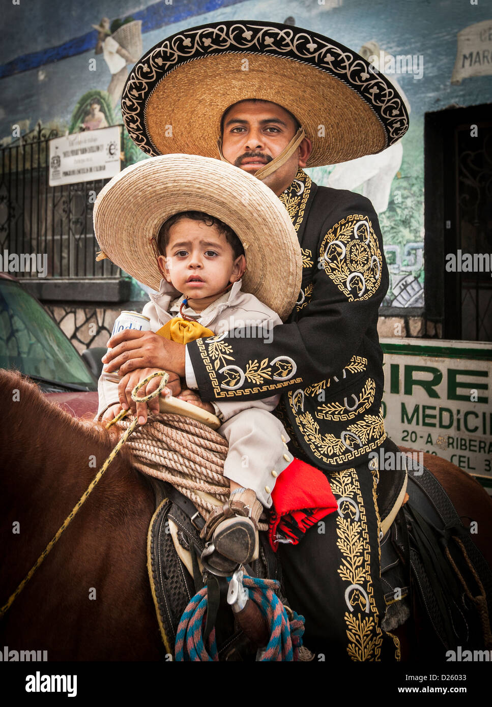 Father and son, charros in a parade in Ajijic, Mexico Stock Photo