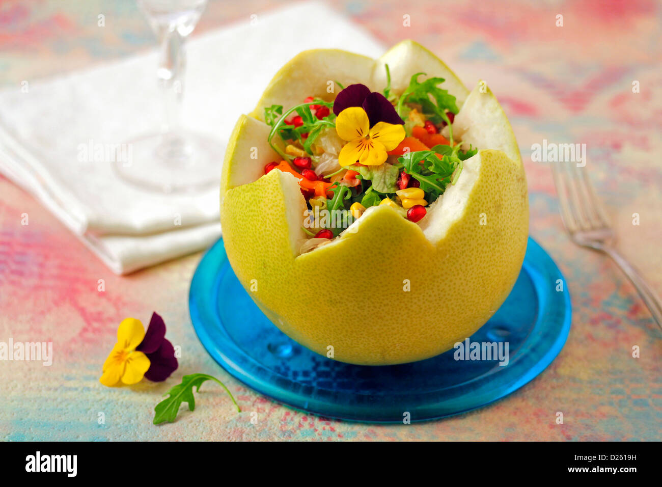 Stuffed grapefruit with salad. Stock Photo