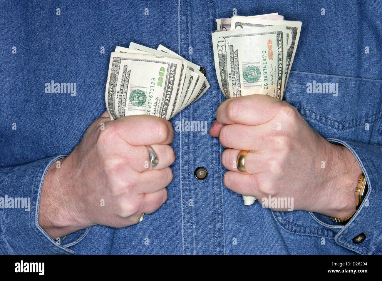 Man holding cash Stock Photo Alamy