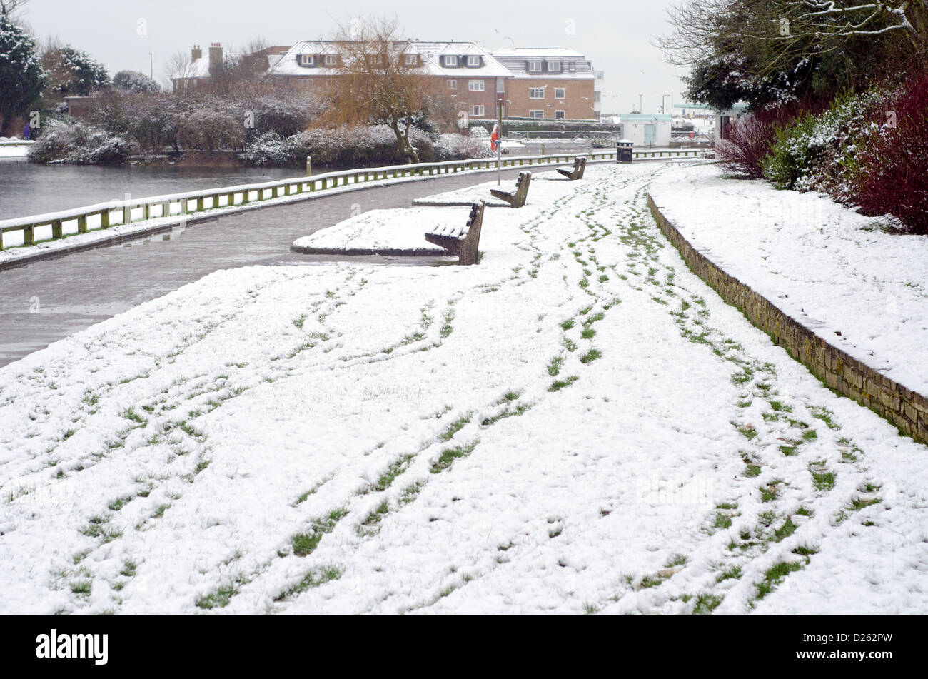 Footprints In The Snow In A Park In Winter In Mewsbrook Park Littlehampton West Sussex England Uk Stock Photo Alamy