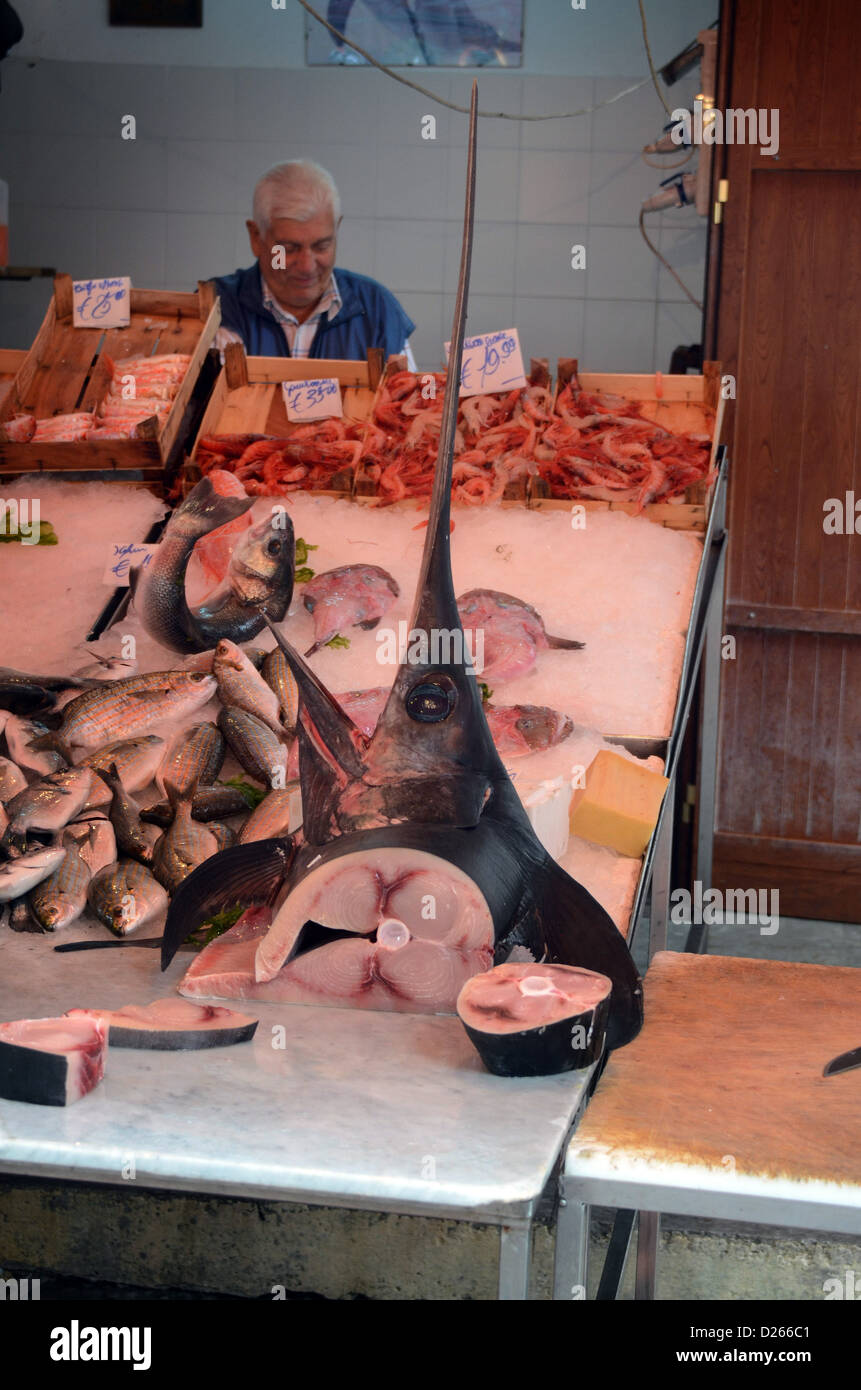 fishmonger selling swordfish in Palermo Stock Photo