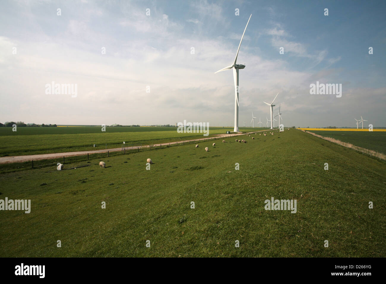 Bredstedt, Germany, North Sea dike with wind turbines on Hamburger Hallig Stock Photo