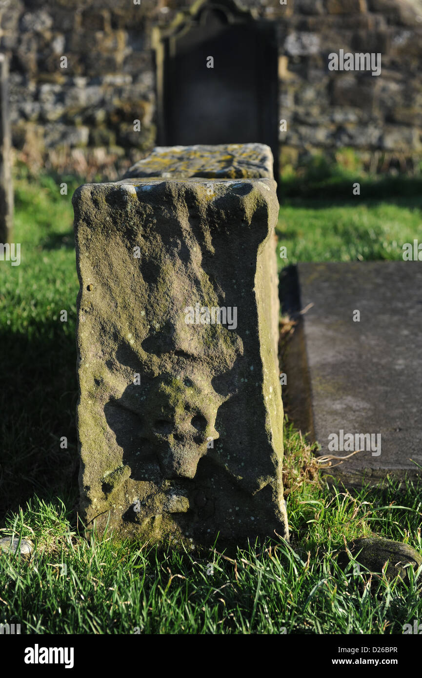 Grave with skull and crossbones in st mary's churchyard, whitby, north