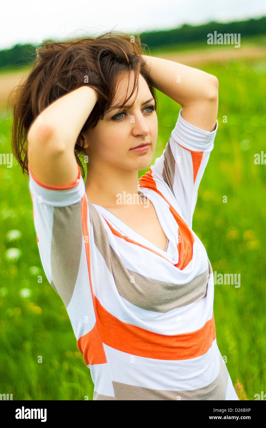 Outdoors portrait of beautiful young brunette girl Stock Photo - Alamy