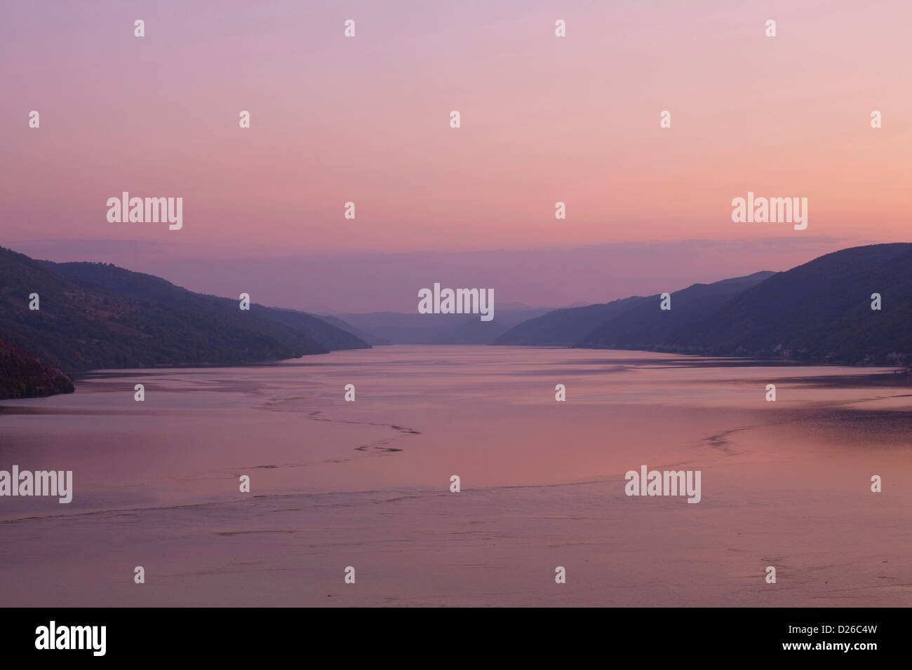 Iron Gate, Portile de Fier. The valley of the Danube looking upstream seen from the Cazanele Mare after sunset. Romania Stock Photo