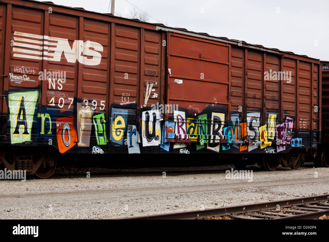Train with graffiti message Stock Photo