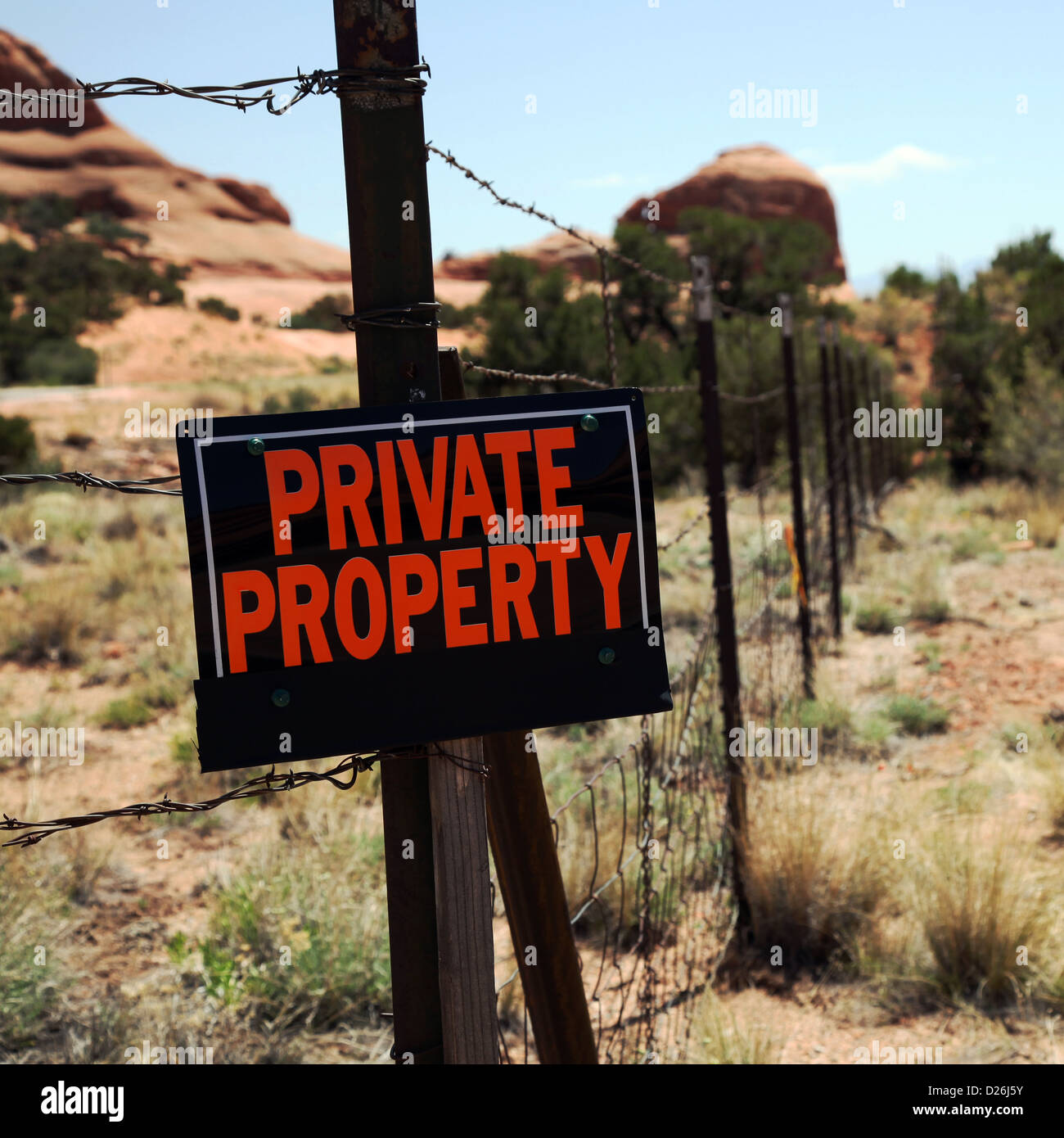 Private property sign on fence Stock Photo
