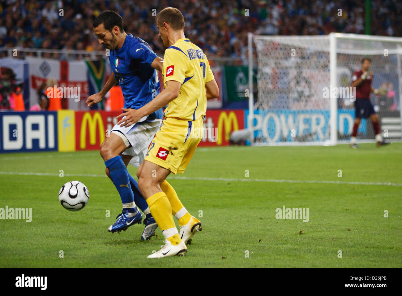 Gianluca Zambrotta of Italy (L) controls the ball against Andriy Nesmachnyi of Ukraine (R) during a World Cup quarterfinal match Stock Photo